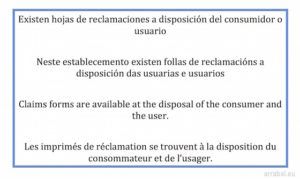 Cartel de hojas de reclamaciones en Castellano, gallego, ingles y frances